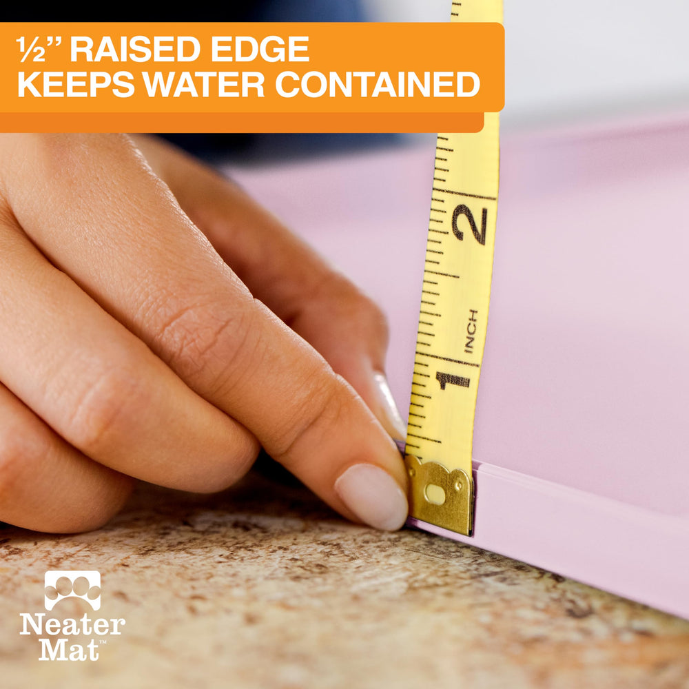 Neater Mat raised-edge closeup highlighting spill containment.