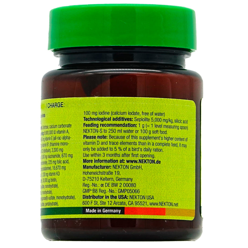 Nekton-S multi-vitamin scoop demonstrates easy dosing for daily bird care.
