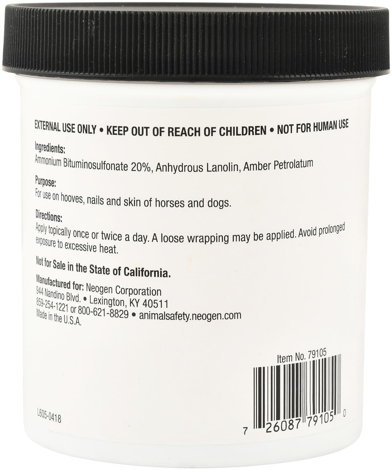 Neogen Drawing Salve Grooming Aid on a dog's paw for skin and nail care
