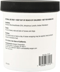 Neogen Drawing Salve Grooming Aid on a dog's paw for skin and nail care
