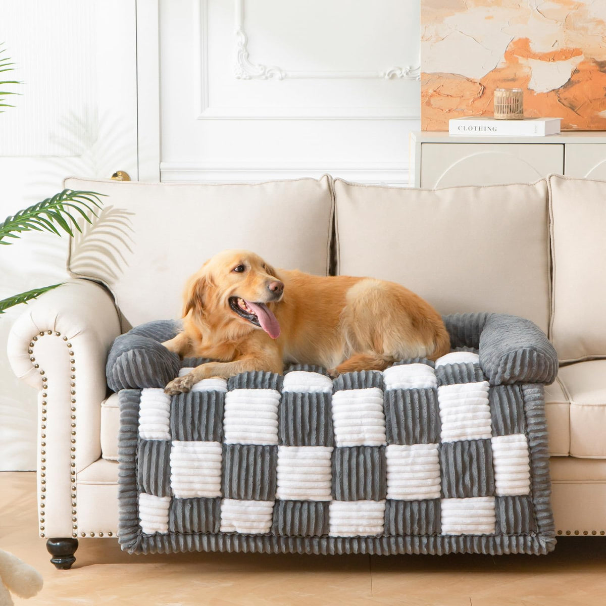 NestlyMoly couch dog bed with bolster offering plush, stable support.