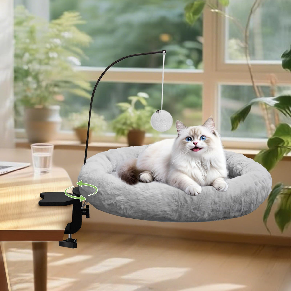 Newmkr cat desk bed with hanging plush ball for playful engagement beside your workflow.