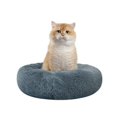 Cama Nisrada para gatos con borde elevado para mayor seguridad.