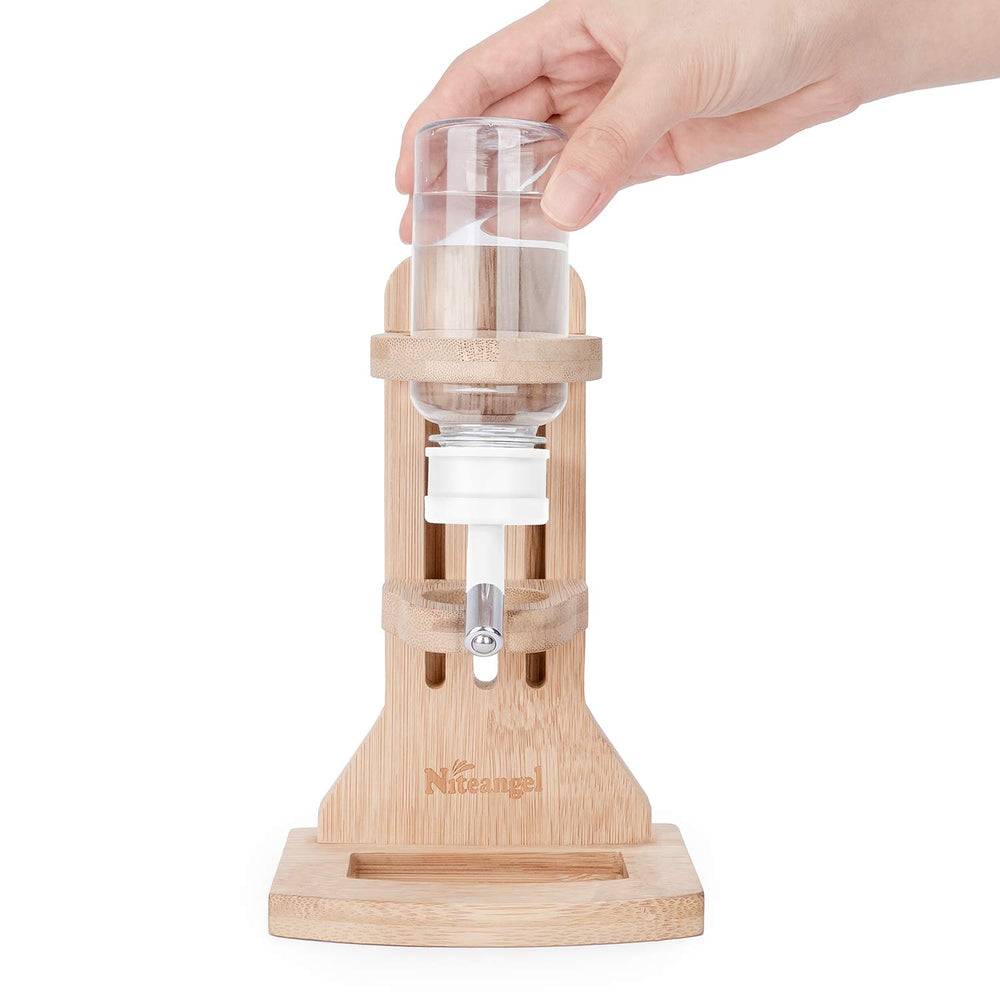 Niteangel water bottle stand in glass tank setup