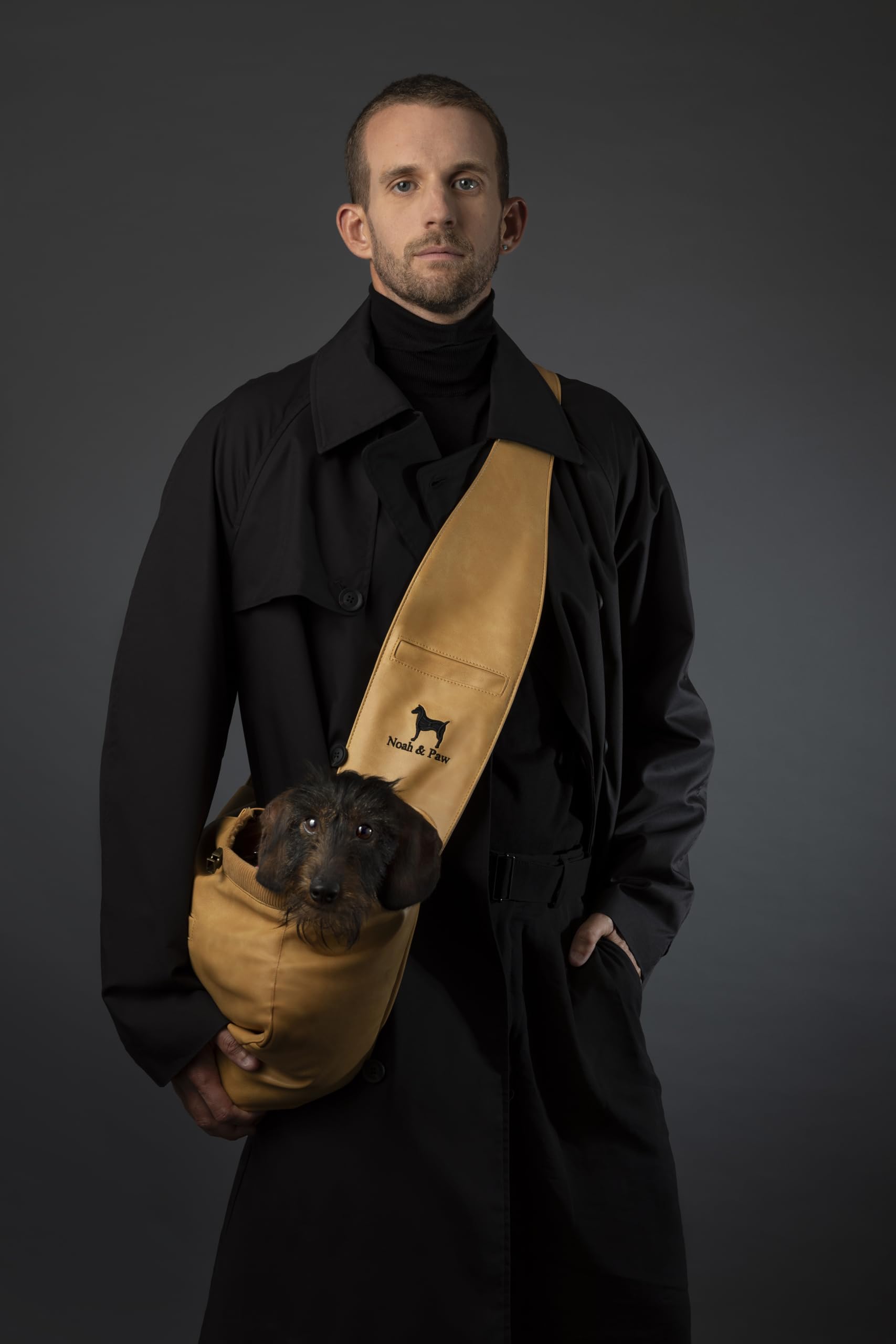 Noah & Paw dog sling adjustable-strap demonstrates a customizable fit for comfort.