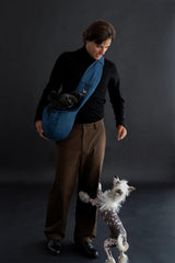 Noah & Paw dog sling adjustable strap demonstrates easy length customization for a perfect fit.
