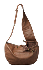 Noah & Paw dog sling carrier closeup shows vegan leather for luxury comfort.