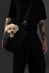 Noah & Paw dog sling carrier with fur-lined interior for cozy on-the-go comfort.