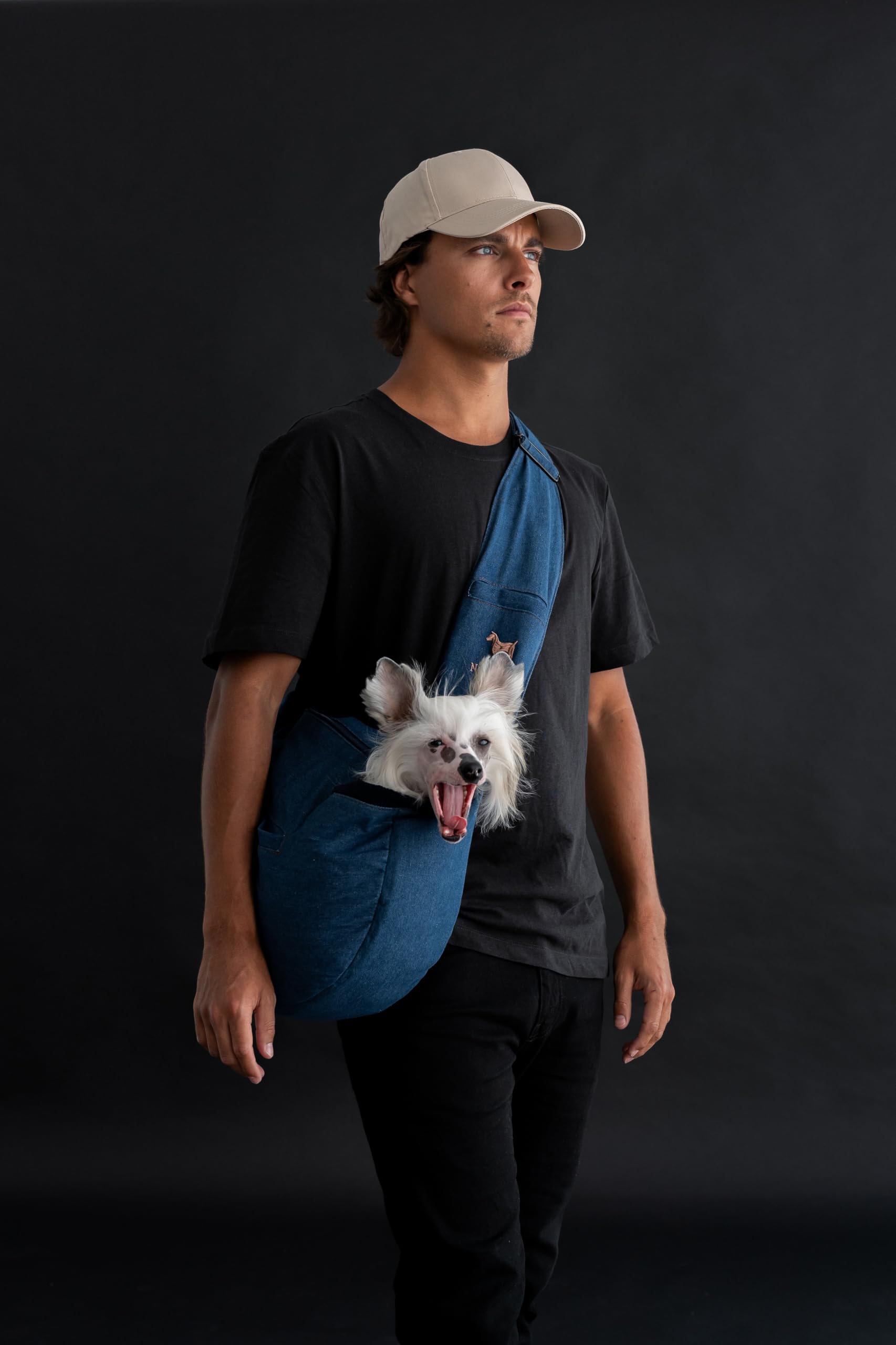 Noah & Paw sling machine-washable materials highlight easy cleanup after adventures.