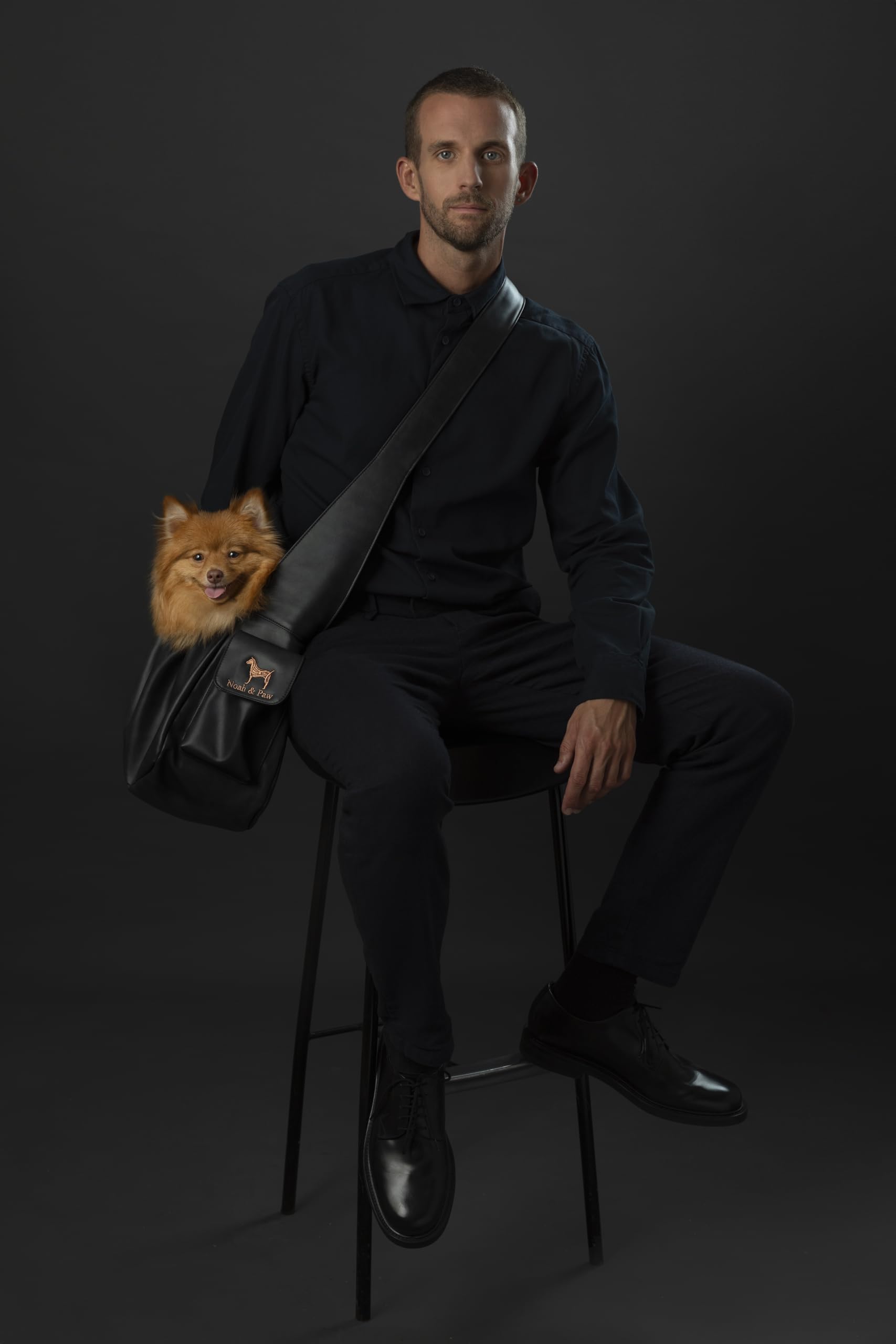 NOAH & PAW dog sling strap adjustment showcasing customizable fit for different body sizes