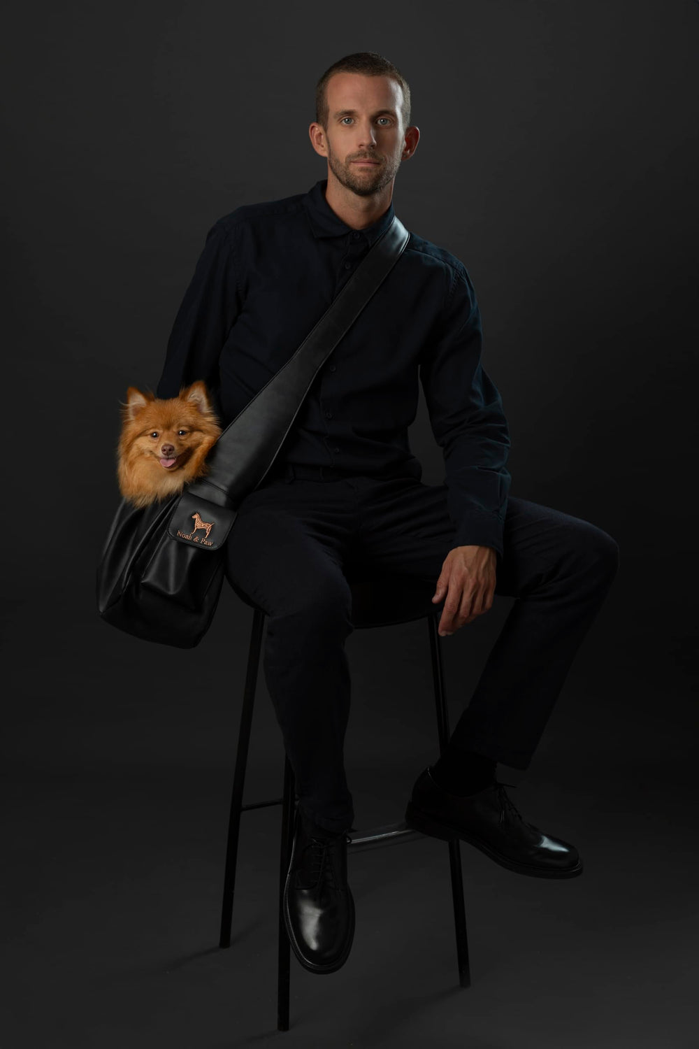 NOAH & PAW dog sling strap adjustment showcasing customizable fit for different body sizes