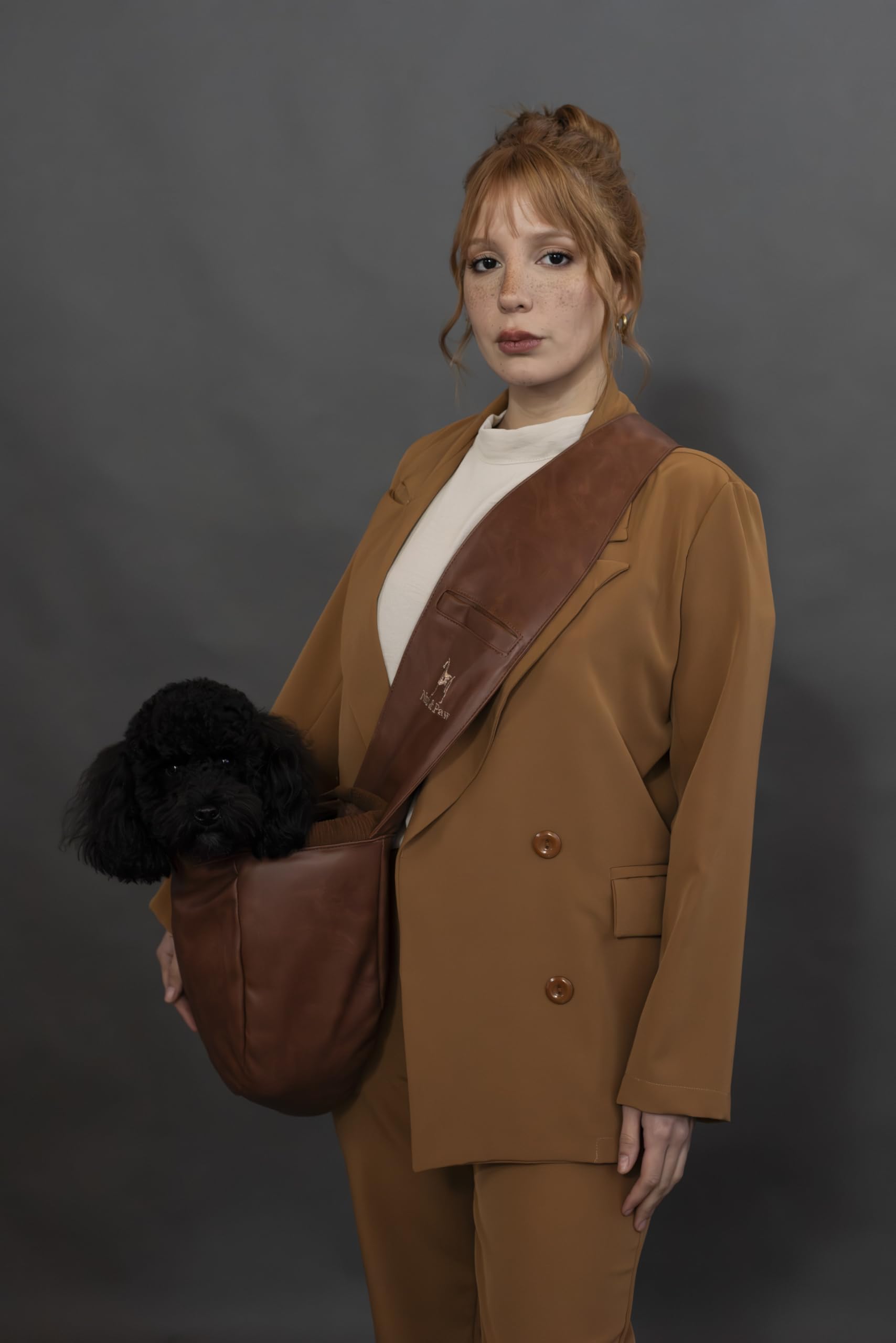 Noah & Paw dog sling used on city strolls with small pets.