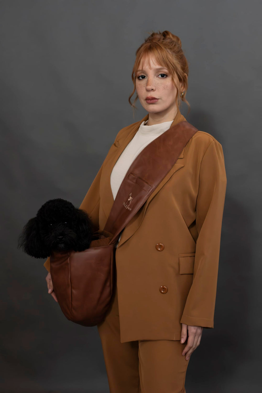Noah & Paw dog sling used on city strolls with small pets.