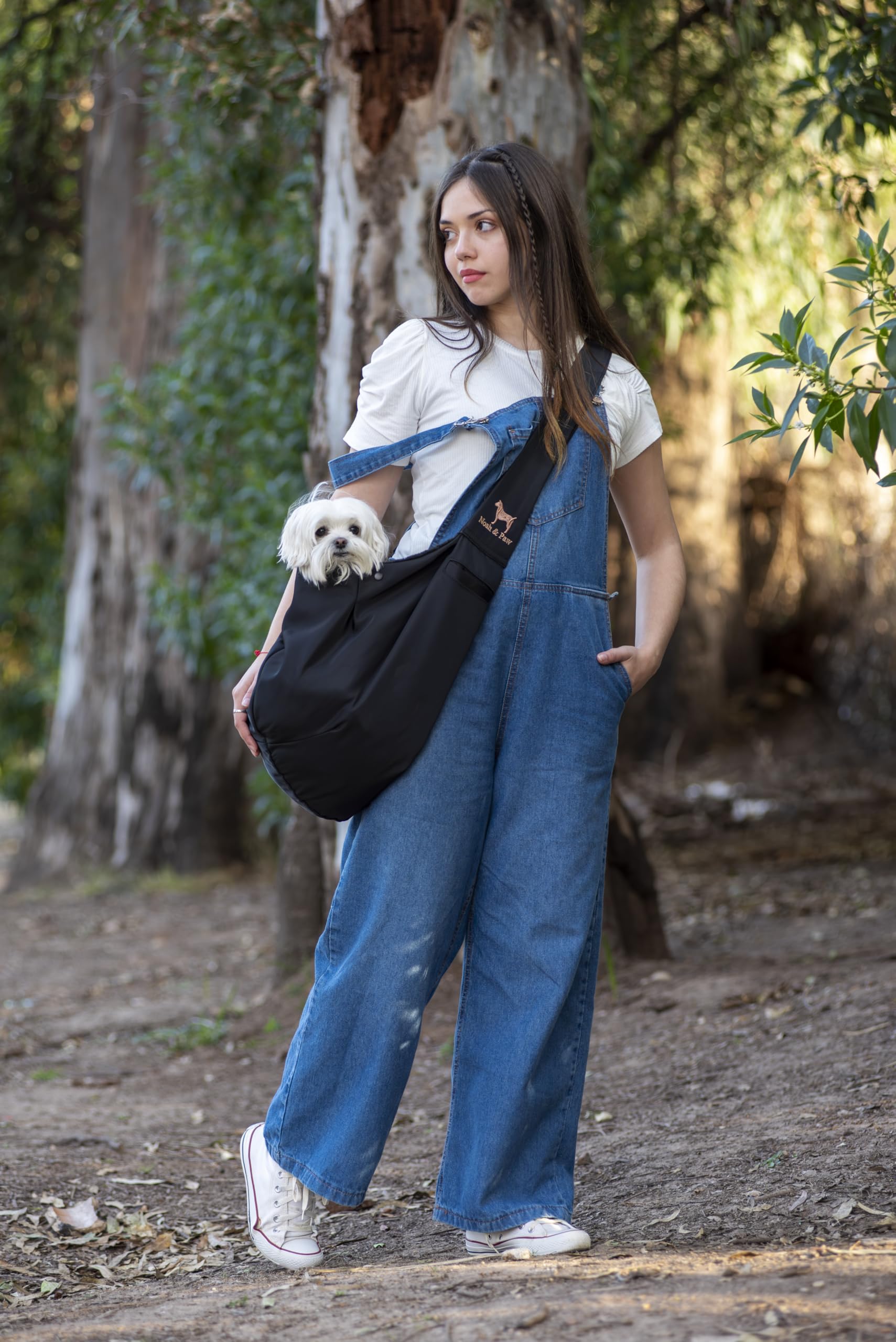 Noah & Paw sling in washable fabric highlights easy cleaning after adventures.