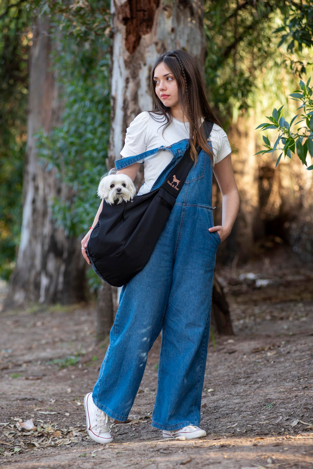 Noah & Paw sling in washable fabric highlights easy cleaning after adventures.