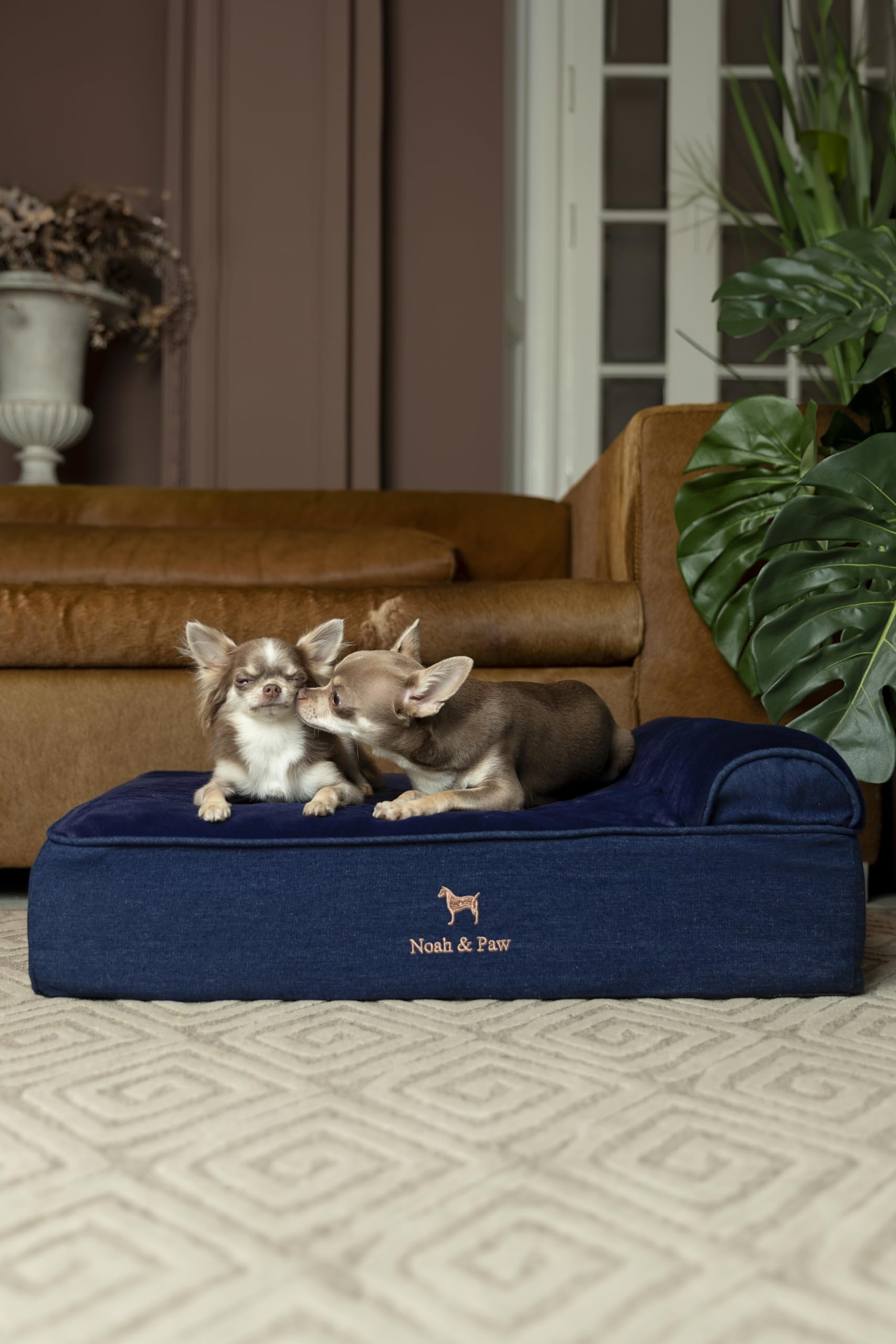 NOAH & PAW Denim dog bed side view showing raised headrest comfort.