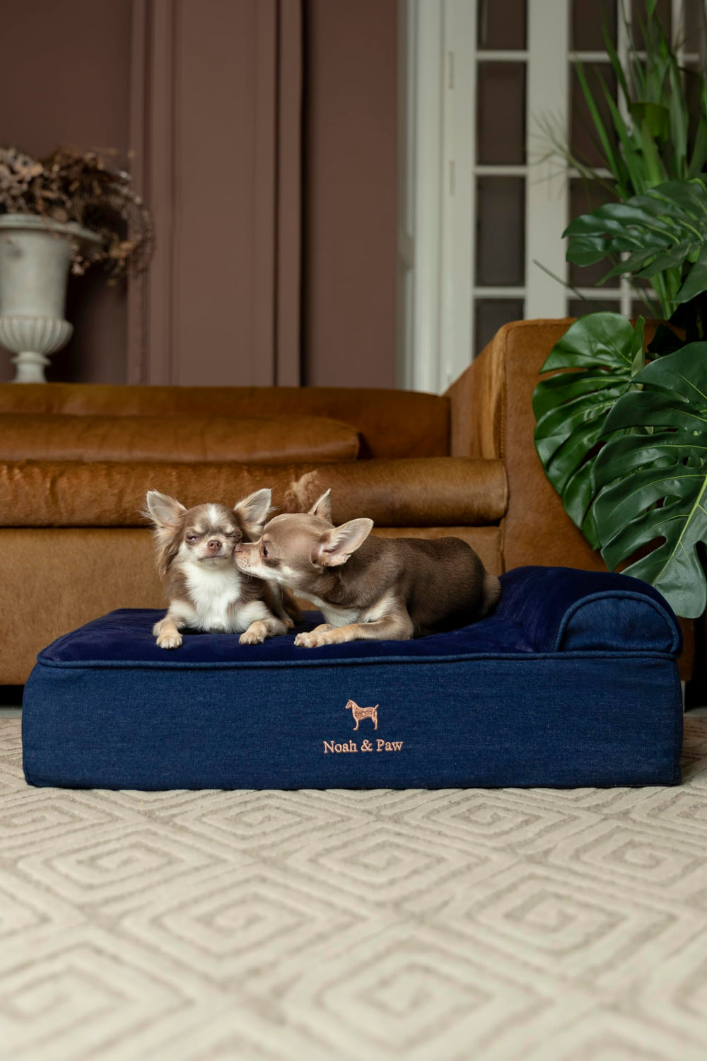 NOAH & PAW Denim dog bed side view showing raised headrest comfort.