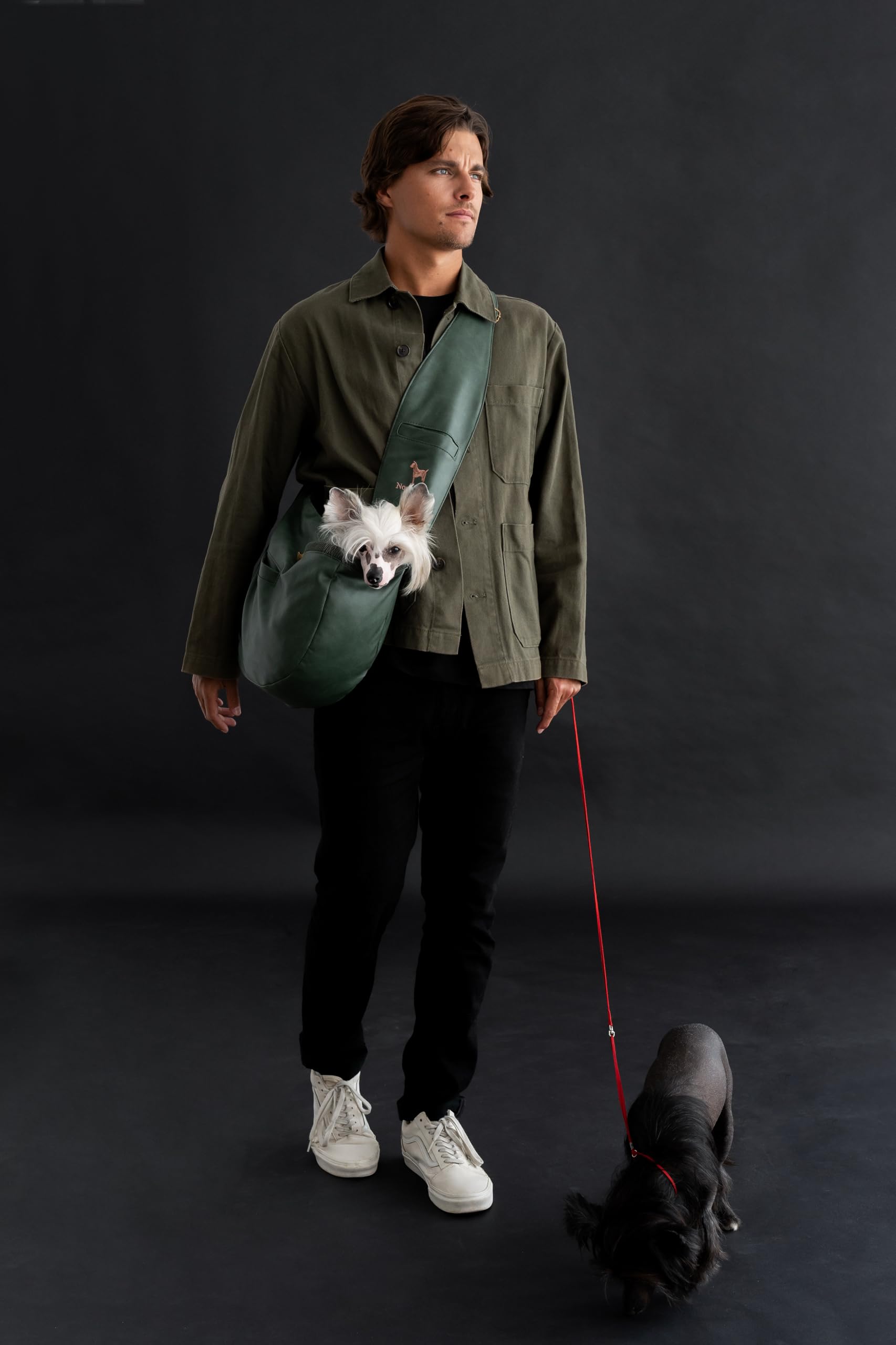Noah & Paw dog sling adjustable padded strap for a customizable fit.