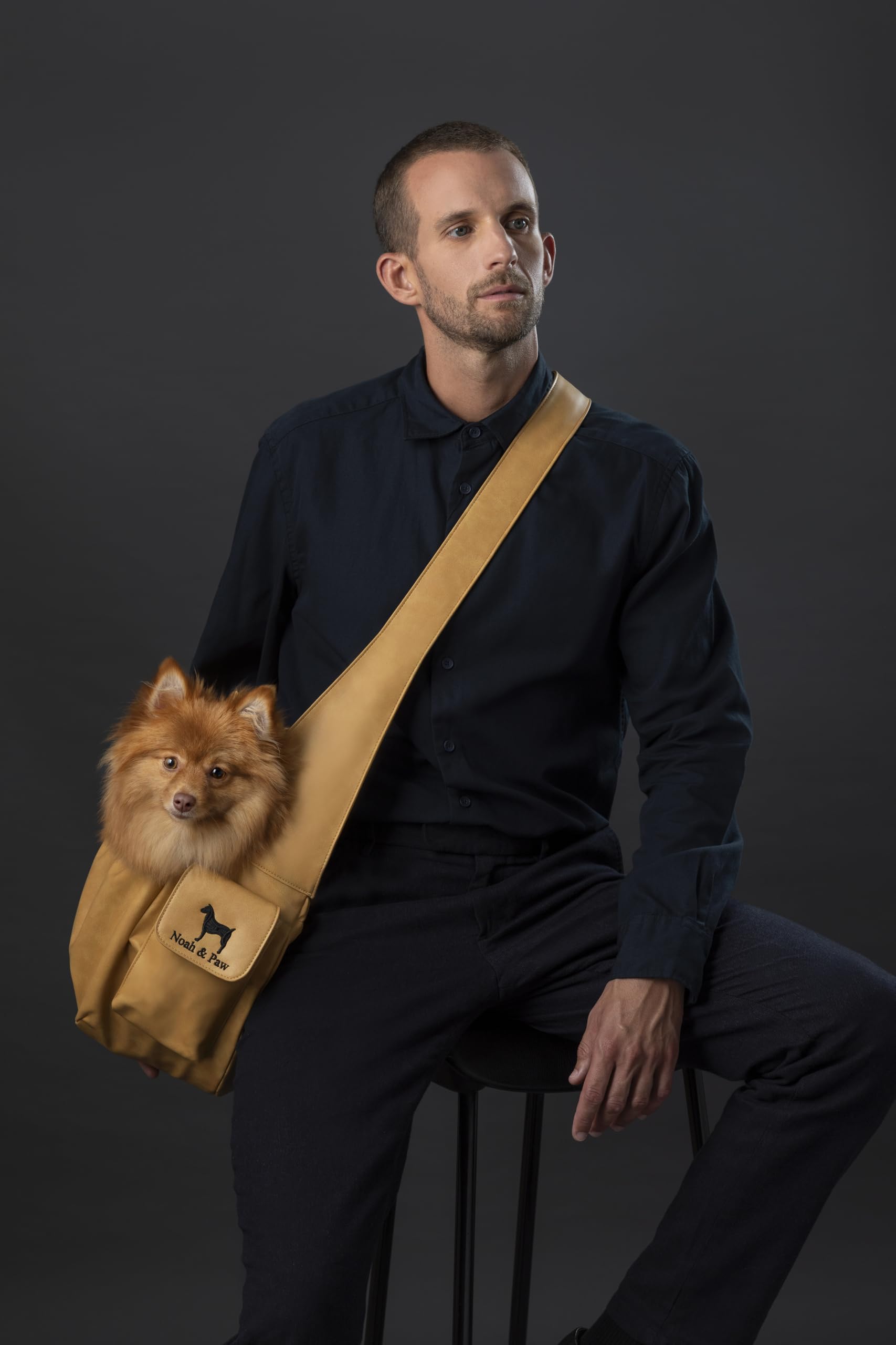 Noah & Paw dog sling vegan leather lining provides luxurious comfort on city strolls.