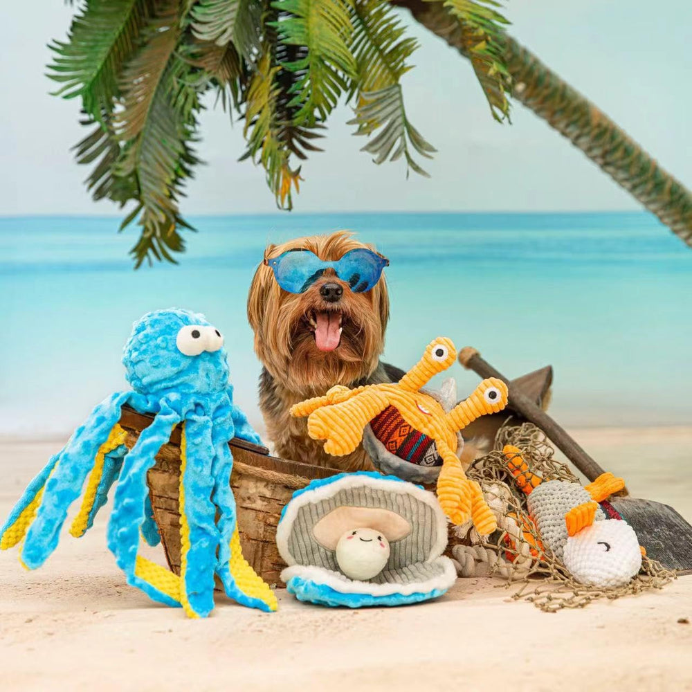 Nocciola ocean adventure salmon toy engages dogs in scent-driven chewing and squeaking.