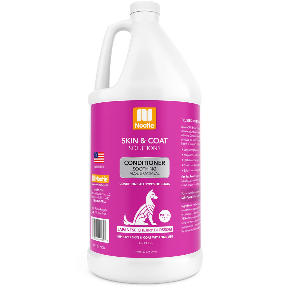 Nootie soothing aloe-oatmeal conditioner bottle pour for Japanese Cherry Blossom scent and coat shine.