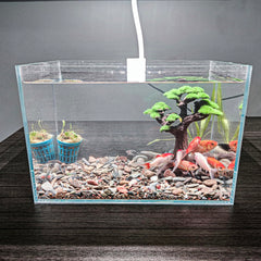 Novelsite bonsai tree with realistic coloring enhances calming visual appeal in small tanks.