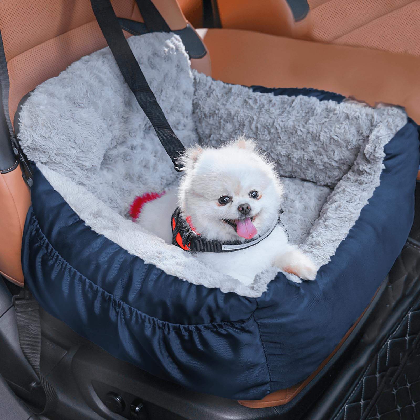 Oiilores dog car seat with clip-on leash keeps small dogs secure on car journeys.