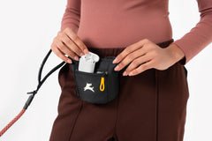 OllyDog Goodie Treat Bag demonstrates three wearing options for belt or leash use.