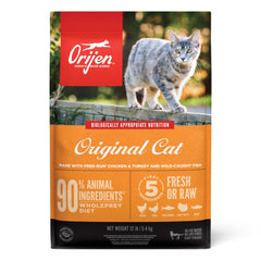 ORIJEN Original dry cat food bag highlights high-protein formula for digestion and coat health.