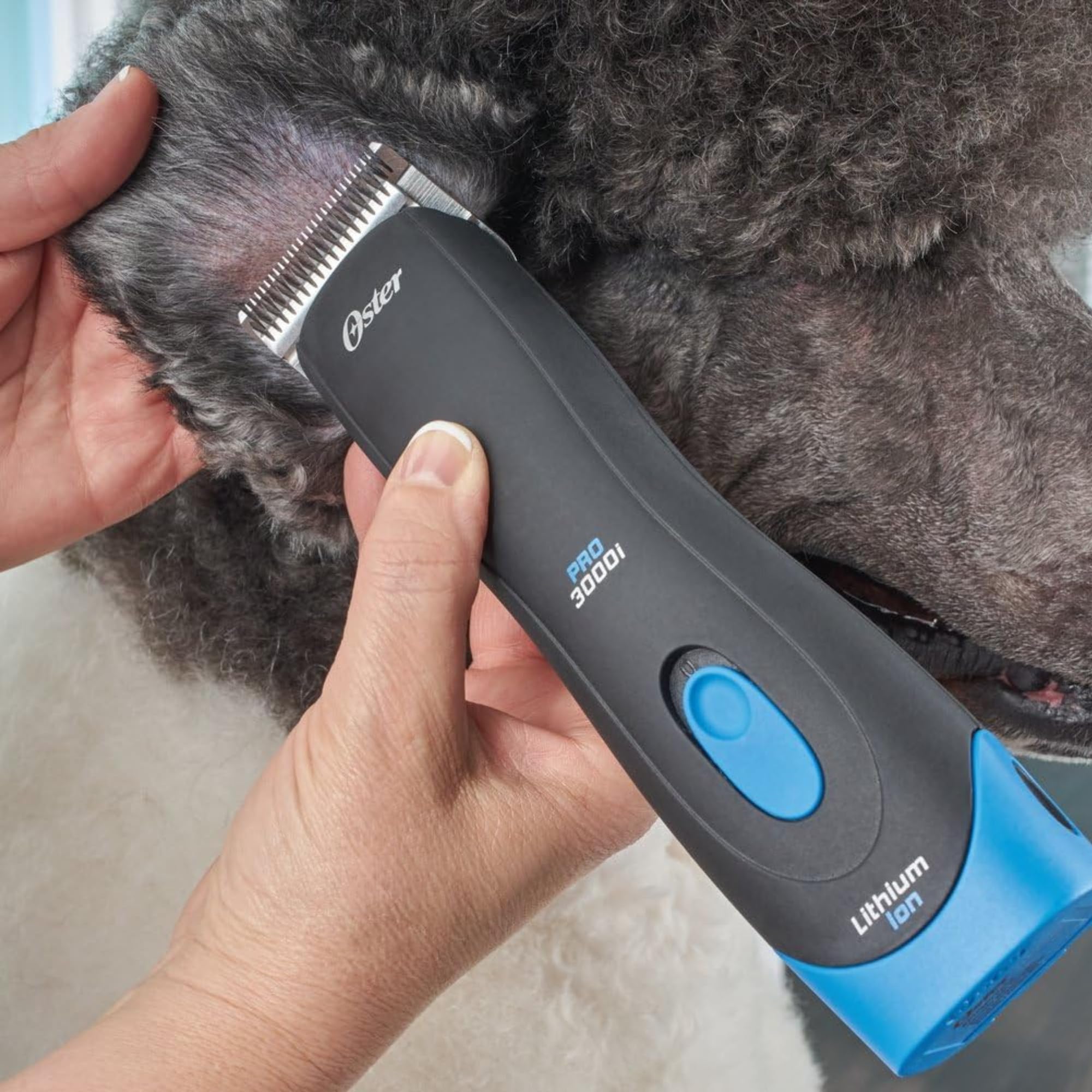 Oster Professional Cordless Clipper in use for efficient grooming of dogs, horses, and livestock.