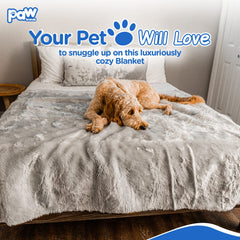 PAW BRANDS PupProtector family using blanket on car seat for travel comfort and protection.