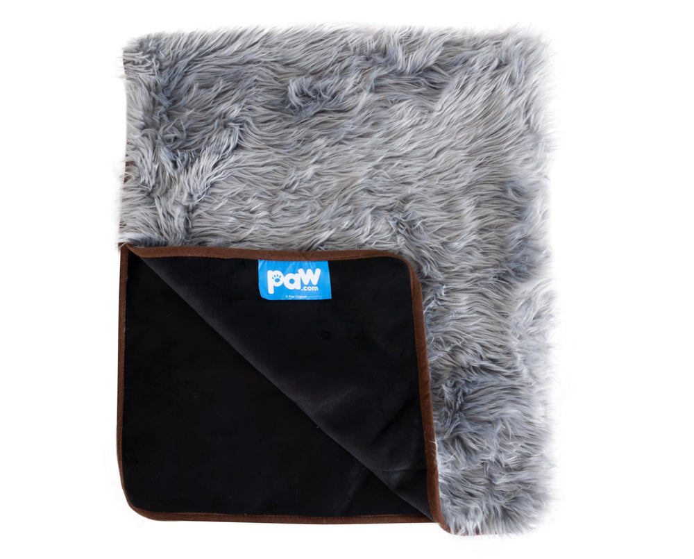 PAW BRANDS PupProtector waterproof blanket on sofa protects furniture from spills and pet messes