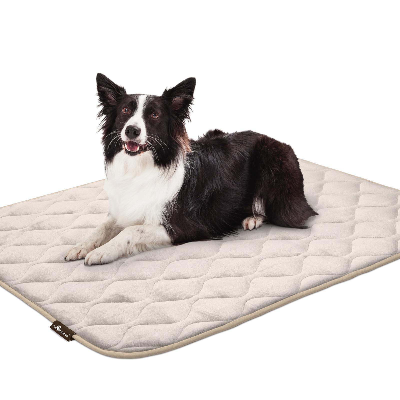 Paw Inspired tan crate mat doubles as versatile bed or nap mat.