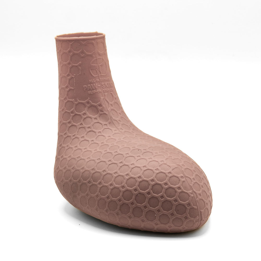 Paw—Skins 2.0 flexible silicone on a medium dog enables natural paw movement.