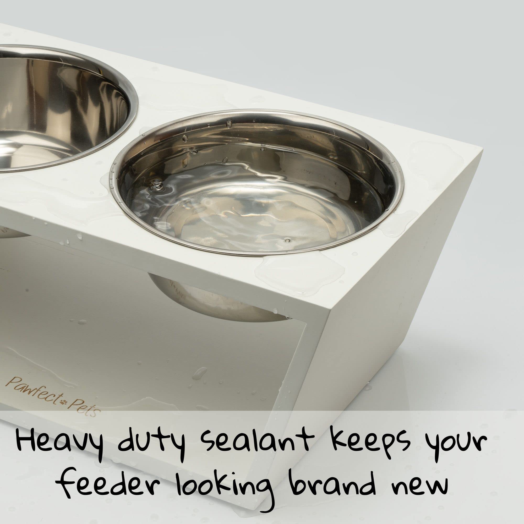 Pawfect Pets elevated dog bowl stand white bowls closeup, stainless steel bowls for easy cleaning.