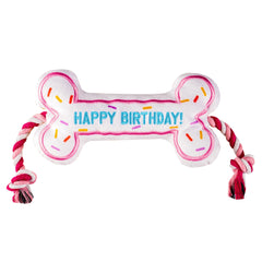 Pawty Dog Toys Birthday Bone Toy pink front view for interactive fetch sessions.