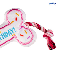 Pawty Dog Toys Birthday Bone Toy pink tug action for bonding games.