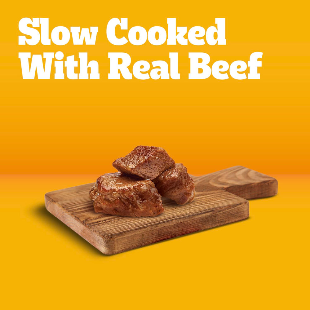 Pedigree Chopped Ground Dinner 13.2 oz cans shown for easy daily feeding.