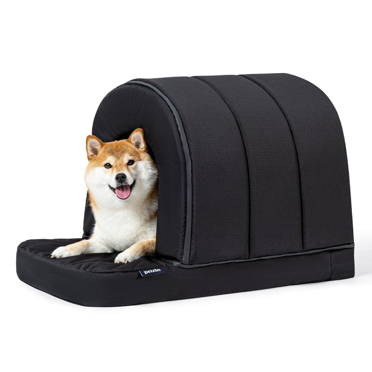 Pelzin orthopedic dog house outdoors with porch provides private retreat for anxious dogs.