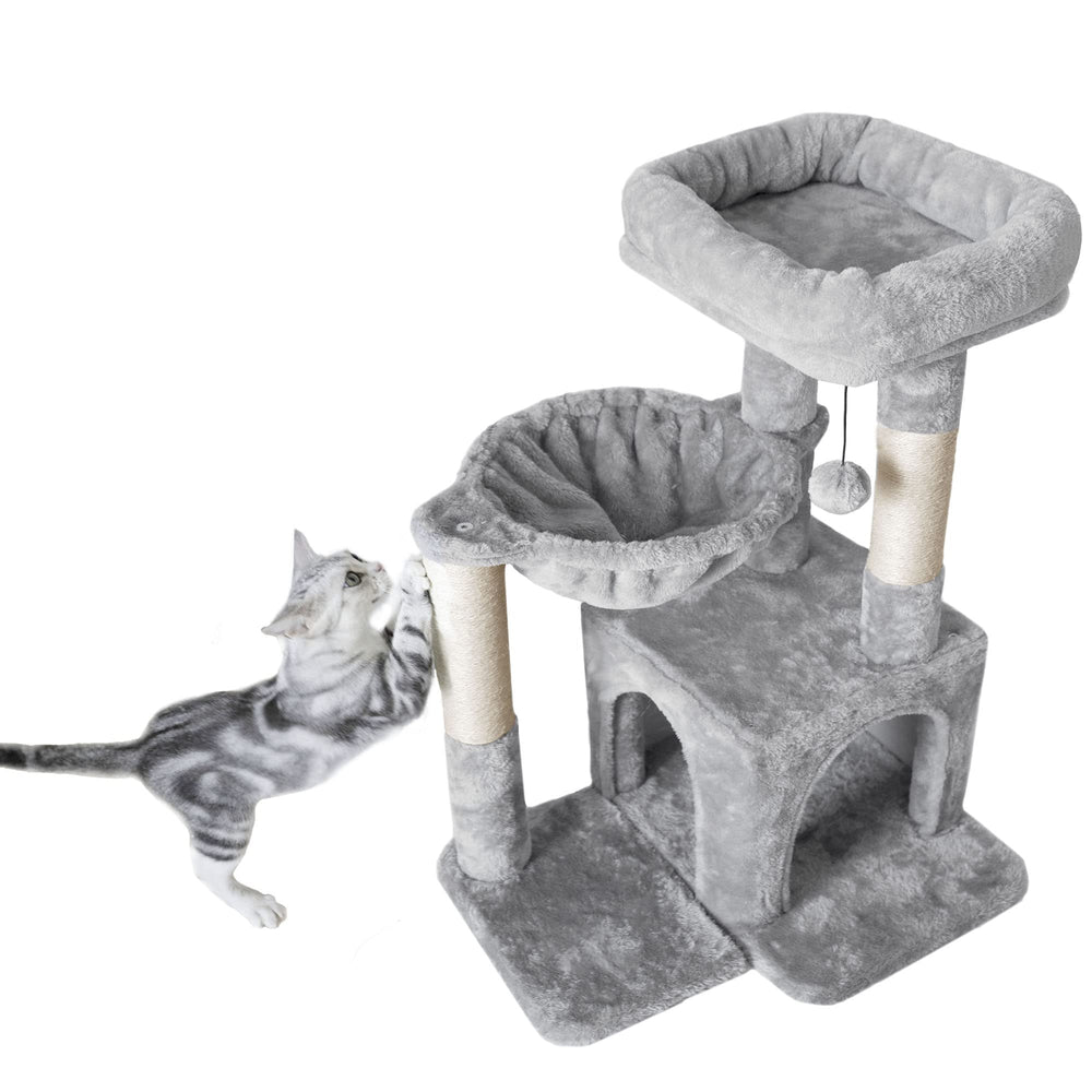 Pesofer cat tree top perch provides high vantage lounging for curious cats.