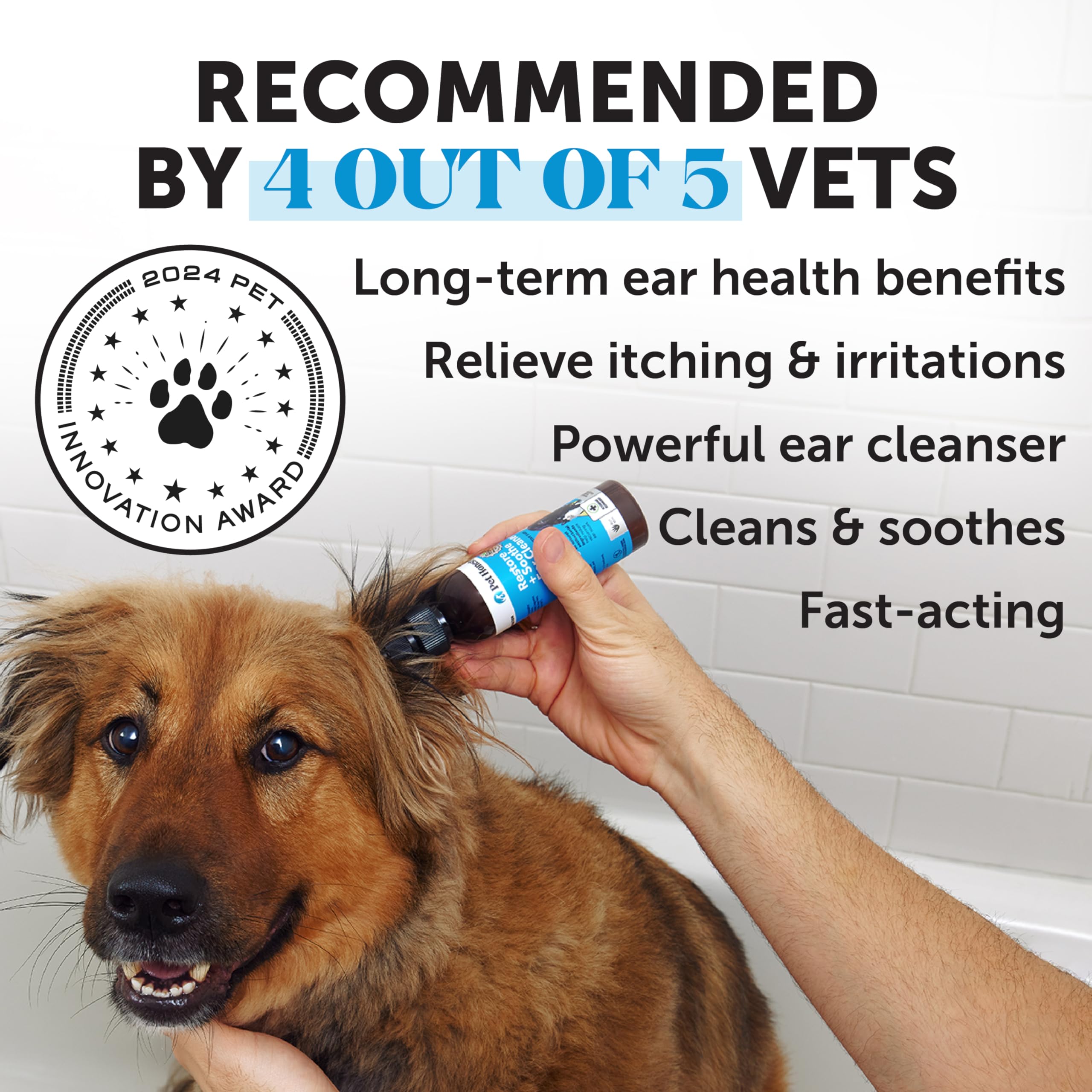 Pet Honesty Restore + Soothe ear cleaner being applied to a dog's ear.