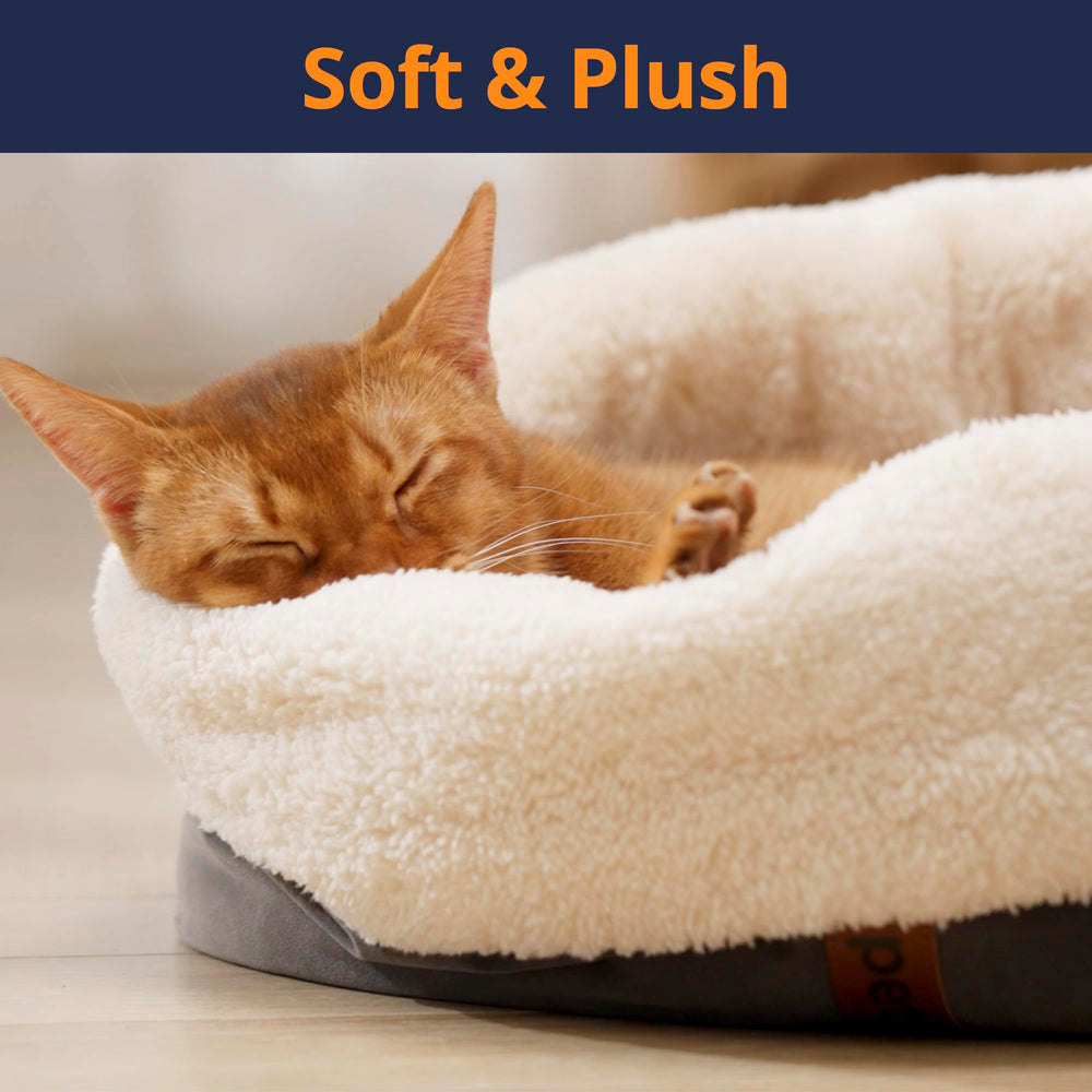 Petace heated bed showing plush wall cushions for curling up.