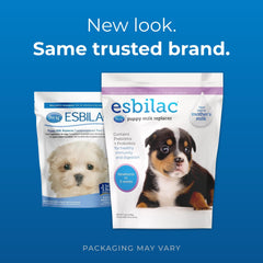PetAg Esbilac puppy milk powder label close-up highlights vitamins and probiotics.