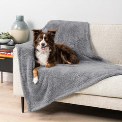 PetAmi fluffy waterproof blanket on sofa protecting furniture from spills.