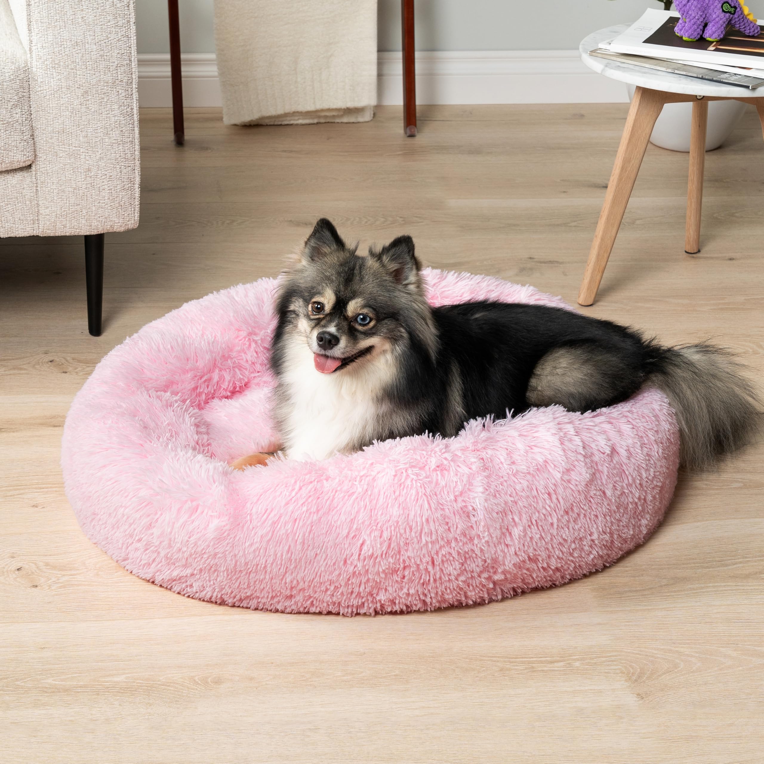 PetAmi round donut bed soft faux fur pink invites cuddling and relaxed lounging.