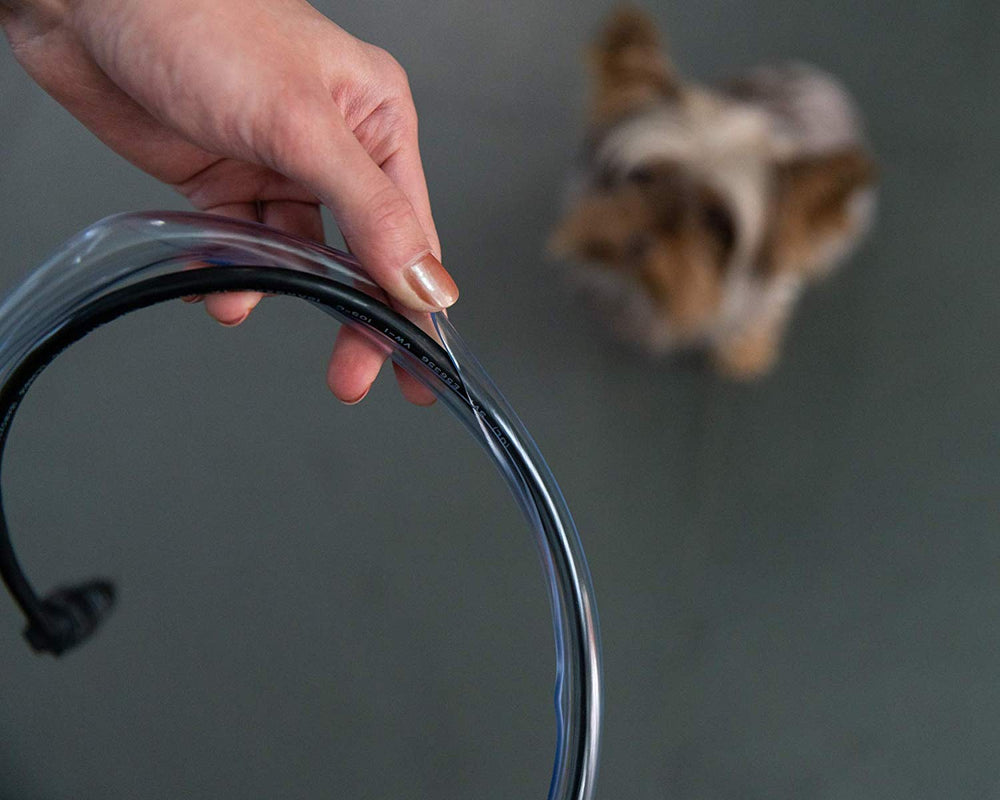PetCords printer cable protector clip demonstrates flexible fit for office devices