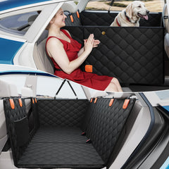 PETICON convertible back-seat extender provides extra space for dogs during car trips.