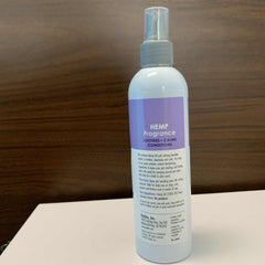 Petkin Hemp Fragrance spray being applied on a pet's coat for a fresh scent