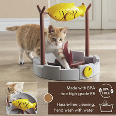 PetPals cat enjoying mealtime with the Grilled Fish toy.