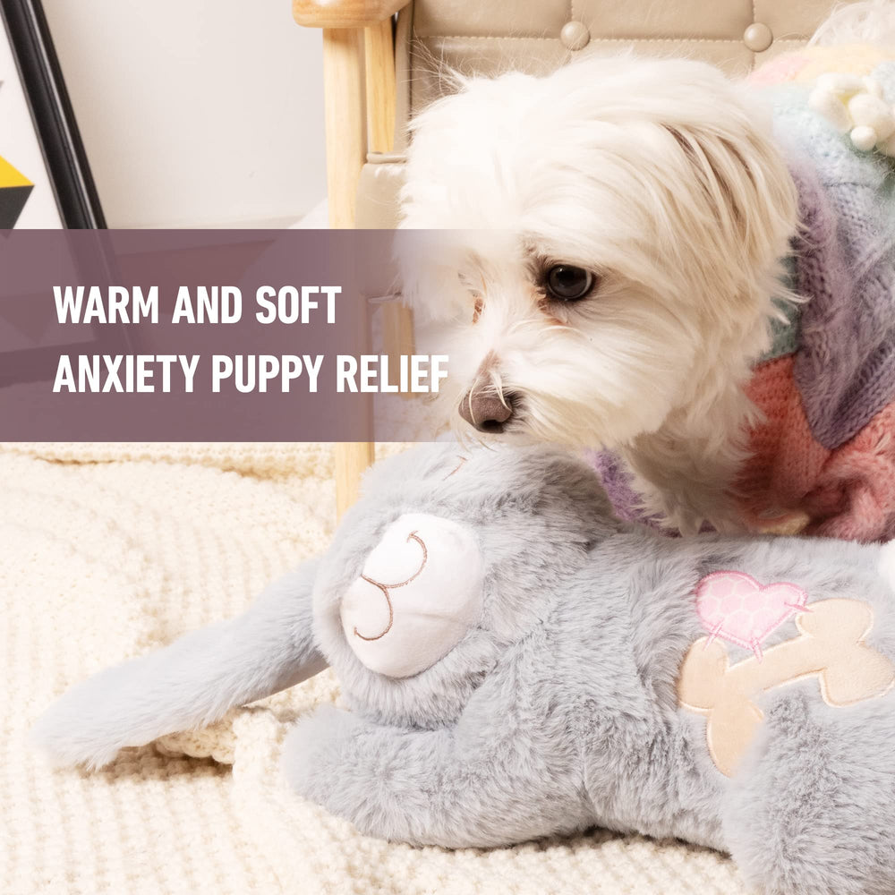 PetPrime puppy sleeping calmly with heartbeat toy for comfort